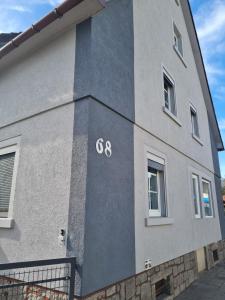 a building with the painted on the side of it at Husic Immobilien und Handwerkerservice in Rimbach