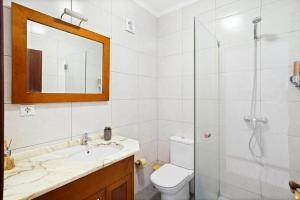 Koupelna v ubytování Ombak Apúlia - Sea view + 18 fotografií