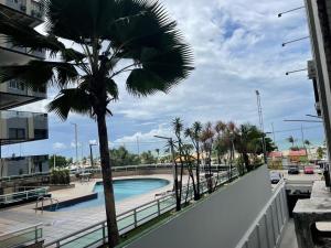 Výhled na bazén z ubytování Apartamento BEIRA MAR nebo okolí
