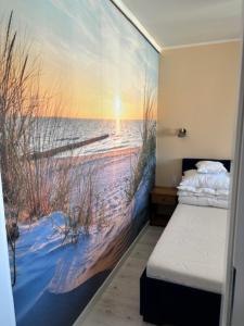 Posteľ alebo postele v izbe v ubytovaní Całoroczny Apartament Perłowa Przystań + 27 fotografií