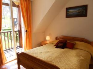 Postel nebo postele na pokoji v ubytování Résidence Pre St Jacques - Appartement 6/8 personnes au village de VIGNEC MAE-6284