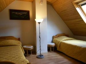 Postel nebo postele na pokoji v ubytování Résidence Pre St Jacques - Appartement 6/8 personnes au village de VIGNEC MAE-6284