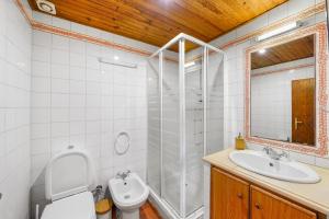 Koupelna v ubytování Trehus Apúlia + 25 fotografií