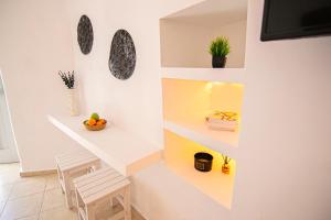 A television and/or entertainment centre at windmills suite by opus
