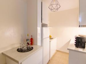 A kitchen or kitchenette at windmills suite by opus