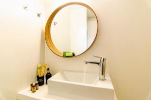 A bathroom at windmills suite by opus