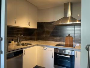Küche/Küchenzeile in der Unterkunft Apartamento en Ares con parking y piscina