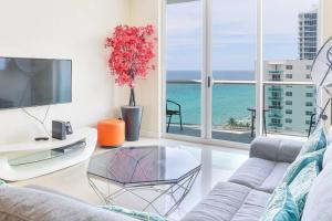 a living room with a view of the ocean at Komffy Penthouse w/ King Bed & Ocean View at Tides in Hollywood