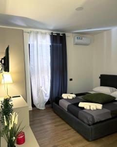 Postel nebo postele na pokoji v ubytování B&b Blog