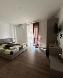 Postel nebo postele na pokoji v ubytování B&b Blog