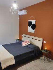 Postel nebo postele na pokoji v ubytování B&B OLTREMARE