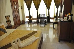Posezení v ubytování Ruean Thai Hotel