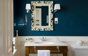 a bathroom with a sink and a mirror at The Marine in Whitstable +30 photos
