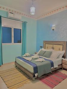 Ένα ή περισσότερα κρεβάτια σε δωμάτιο στο Luxury Family Apartment