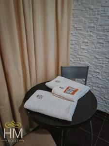 Postel nebo postele na pokoji v ubytování HOTEL HM