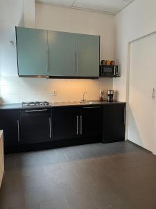 Dapur atau dapur kecil di Stadsappartement Valkhof