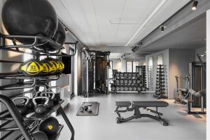 a gym with helmets and equipment in a room at Residence Inn by Marriott Copenhagen Nordhavn in Copenhagen