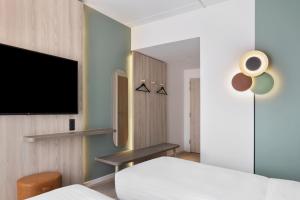 TV a/nebo společenská místnost v ubytování Fairfield by Marriott Copenhagen Nordhavn