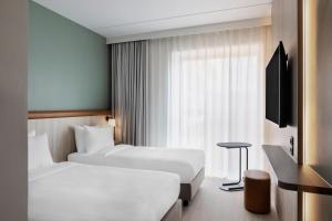 TV a/nebo společenská místnost v ubytování Fairfield by Marriott Copenhagen Nordhavn