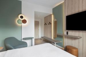 TV a/nebo společenská místnost v ubytování Fairfield by Marriott Copenhagen Nordhavn