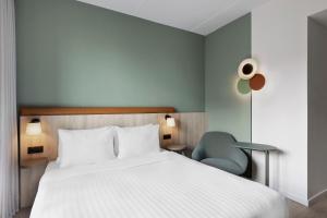 Postel nebo postele na pokoji v ubytování Fairfield by Marriott Copenhagen Nordhavn