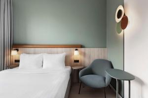 Postel nebo postele na pokoji v ubytování Fairfield by Marriott Copenhagen Nordhavn