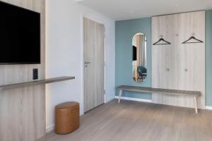 TV a/nebo společenská místnost v ubytování Fairfield by Marriott Copenhagen Nordhavn