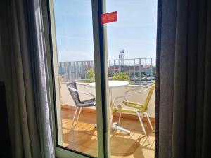 Балкон или терраса в Hotel Euro Moniz