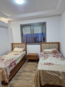 Postel nebo postele na pokoji v ubytování superb appartement