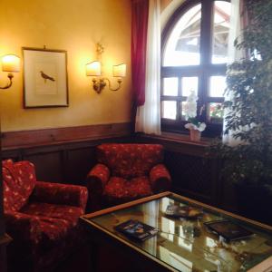 Χώρος καθιστικού στο RTA Hotel Catturani