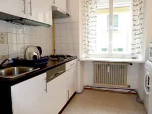 Kuchyň nebo kuchyňský kout v ubytování Apartment Jakominiplatz