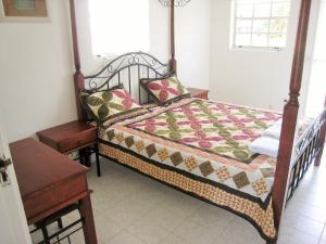 Cama ou camas em um quarto em Alablanca Apartments Residents Inn