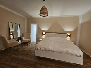 Ένα ή περισσότερα κρεβάτια σε δωμάτιο στο Cosy Apartment Kempen