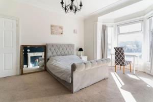Ένα ή περισσότερα κρεβάτια σε δωμάτιο στο Quiet & Cosy 3BedRoom - Great Base in South Shields near Hospital and Port of Tyne - Free Parking