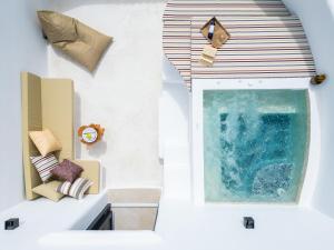 Postel nebo postele na pokoji v ubytování Electra Suites & Spa