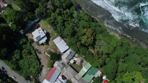 an overhead view of a house next to the ocean at Rocking J's in Puerto Viejo