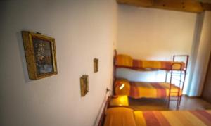 Postel nebo postele na pokoji v ubytování Casa Enrico