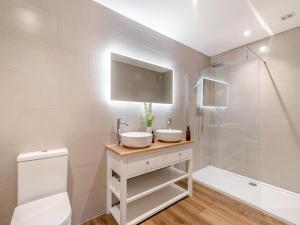 a bathroom with a sink and a shower at The Cedars Cottage 2 - Uk46778 in Cloughton