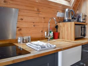 a kitchen with a sink and a counter top at Selker View-uk1397 in Corney