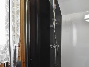 a shower in a bathroom with a glass door at Selker View-uk1397 in Corney
