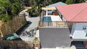 an overhead view of a house with a swimming pool at Go Boutique Inn in Puerto Princesa City