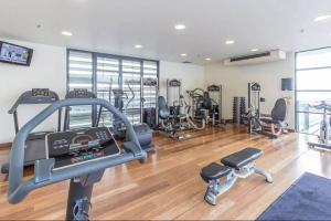 The fitness centre and/or fitness facilities at Kiwiana Suite - newly refurbished - rooftop pool
