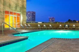 a swimming pool on the roof of a building at Sheraton Suites Galleria Atlanta in Atlanta