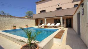 Πισίνα στο ή κοντά στο Ferienhaus mit Privatpool für 6 Personen ca 89 qm in Manjadvorci, Istrien Bucht von Raša