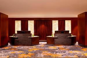 a lobby with two podiums in a room with windows at The Westin Peachtree Plaza, Atlanta in Atlanta