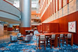 a dining room with a table and chairs at The Westin Peachtree Plaza, Atlanta in Atlanta