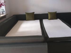 Säng eller sängar i ett rum på Reindler Modern retreat