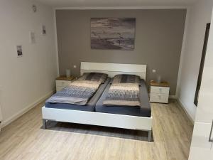 a bedroom with two beds in a room at This year with lake view in Pönitz am See