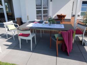a table and chairs sitting on a patio at Seepferdchen in Trent