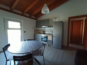 Kuchyň nebo kuchyňský kout v ubytování B&B Tra Gli Ulivi